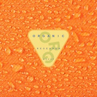 an orange background with water droplets on it